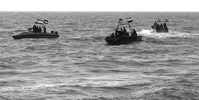 MEMBERS OF the Yemeni Coast Guard affiliated with the Houthi group patrol the sea as demonstrators march through the Red Sea port city of Hodeida in solidarity with the people of Gaza on Jan. 4, 2024, amid the ongoing battles between Israel and the militant Hamas group in Gaza. (AFP via Getty Images/TNS)