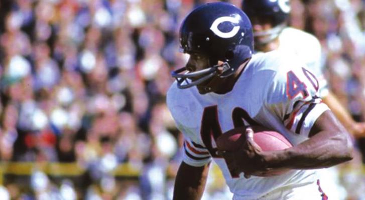 GALE SAYERS set many records as an elusive running back for the Chicago Bears. Here he is in action. Sayers passed away last week at the age of 77.