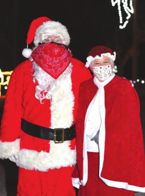 Standing in for Santa and Mrs. Claus were Steve Mills and Marilyn Leaming.