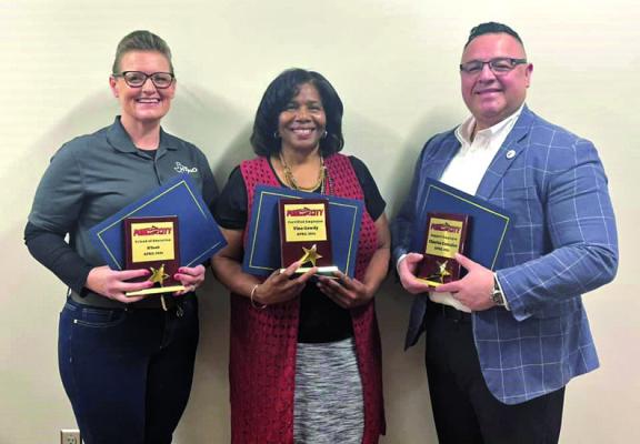 A PRESENTATION of the April Employee of the Month and Friend of Education Awards was made at Monday’s meeting. Pictured from left to right are The Friend of Education HTeaO; Certified Employee of the Month Vina Gowdy; and Support Employee of the Month Charles Gonzales. (Photo Provided)