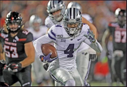 MALIK KNOWLES (4) of Kansas State (4) runs with the ball during the team’s football game against Texas Tech Nov. 23 in Lubbock, Texas. K-State will do battle with Iowa State this week. (AP Photo)