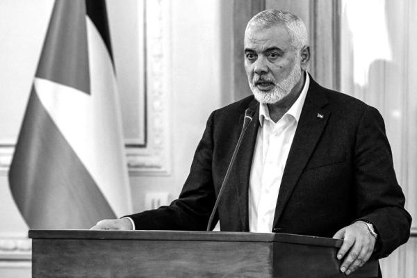 ISMAIL HANIYEH, the Doha-based political bureau chief of the Palestinian Islamist movement Hamas, speaks to the press after a meeting with the Iranian foreign minister in Tehran on March 26, 2024. Haniyeh’s visit to Tehran comes a day after a resolution adopted by the UN Security Council called for an “immediate ceasefire” for the ongoing Muslim holy month of Ramadan, leading to a “lasting” truce. (-/AFP via Getty Images/TNS)