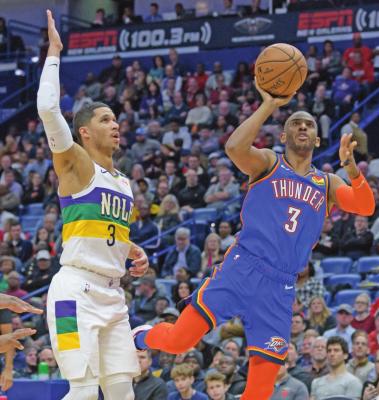 OKLAHOMA CITY Thunder guard Chris Paul (3) shoots next to New Orleans Pelicans guard Josh Hart (3) during the first half of an NBA basketball game in New Orleans, Thursday, Feb. 13, 2020. (AP Photo)