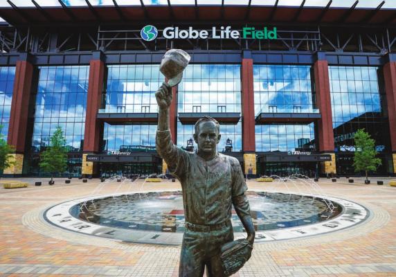 IN THIS MARCH 31, 2020, file photo, a statue of Nolan Ryan stands in the empty plaza outside Globe Life Field in Arlington, Texas. The new Texas Rangers ballpark is among possible venues Major League Baseball could use if it decides to start the season with groups of teams in different areas. Among the different plans looked at by Major League Baseball is to use Texas as a mid-American hub. (Smiley N. Pool/The Dallas Morning News via AP, Pool, File)