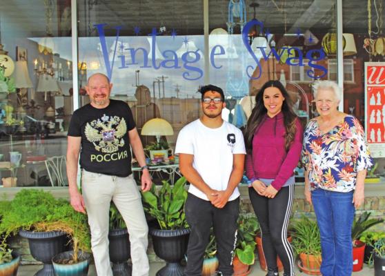 Pictured left to right: Vintage Swag owner Bret Carter and employees Aaron Amador, Deidra Elliott and Kathy Coffman. (Photo by Calley Lamar)