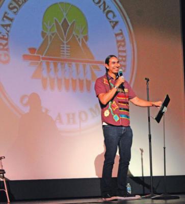 Actor/comedian Tatanka Means visited the Poncan Theatre in an event presented by the Ponca Tribe and the Kaw Nation. Means is pictured here during his stand-up routine. (Photo by Calley Lamar)