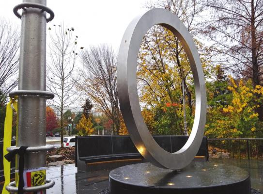 The National Native American Veteran Memorial is a stainless steel sculpture raised atop a carved stone drum. Jessie Christopher Smith/Gaylord News