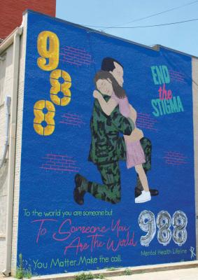 THIS MURAL, located behind The Grand Central Court building in Ponca City, displays 988, the new mental health resource in Oklahoma. (Photo by Calley Lamar)