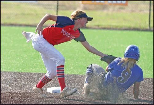 TAGGING OUT a Glenpool base runner at second base is Ponca City’s Kaylee Meyer during a softball game Monday at the West Middle School field. The Lady Cats dropped a 11-8 decision to Glenpool. This photo was provided by Larry Williams.