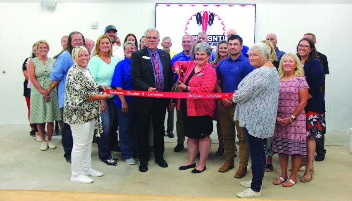 Northern Oklahoma College staff and faculty pose with the supporters of the new Technology Building as they hold a ribbon cutting with the Tonkawa Chamber of Commerce