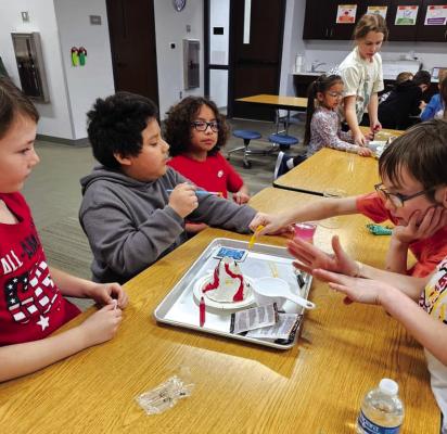 KAY COUNTY 4-H students build their own personal volcano during the 4-H STEM workshop held Feb. 9 at the Kay County Extension Office. STEM stands for Science, Technology, Engineering and Math. The program hopes to hold more workshops this year. (Photo provided)