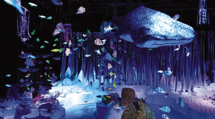 Seed Reef will let visitors walk “underwater” through the screen printed, sculpted paper reef as it transitions from a colorful, vibrant section full of corals, fish, and other sea life to a barren wasteland of bleached coral skeletons. (Photo Provided)