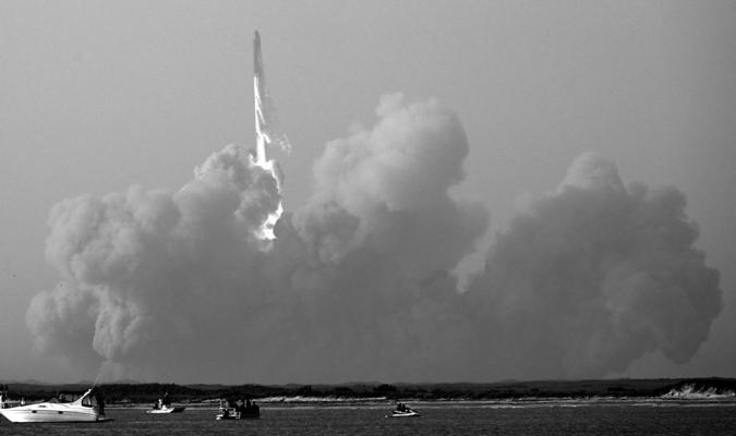 The SpaceX Starship lifts off from the launchpad during a flight test from Starbase in Boca Chica, Texas, on April 20, 2023. The rocket successfully blasted off at 8:33 am Central Time ( 1333 GMT). The Starship capsule had been scheduled to separate from the first-stage rocket booster three minutes into the flight but separation failed to occur and the rocket blew up. (Patrick T. Fallon/ AFP/Getty Images/TNS)