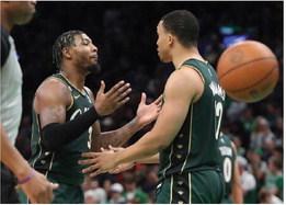 Boston Celtics’ Marcus Smart talks with Grant Williams during overtime of the game against the New York Knicks at the TD Garden on Sunday,March 5, 2023 in Boston, MA. (Staff Photo By Nancy Lane/MediaNews Group/Boston Herald)