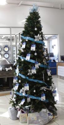 The Guardian Angel Gift Tree sits in the lobby of Heather Cannon Honda for the citizens of Ponca City to sponsor a child in the community. (Photo by Dailyn Emery)