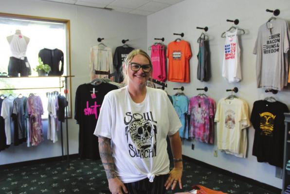 Danielle Nall is the owner of Rocky’s Hot Mess Express located on 122 E. Grand Ave. in the Grand Central Court building. The store offers clothing, shoes, jewelry and bath bombs. (Photo by Calley Lamar)