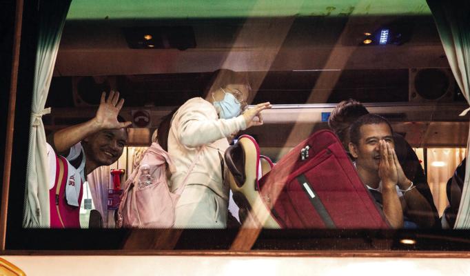 THAI NATIONALS who were taken hostage by Hamas militants on Oct. 7, 2023, prepare for their journey home after being released on Nov. 30, 2023 in Bangkok, Thailand. (Lauren DeCicca/Getty Images/TNS)