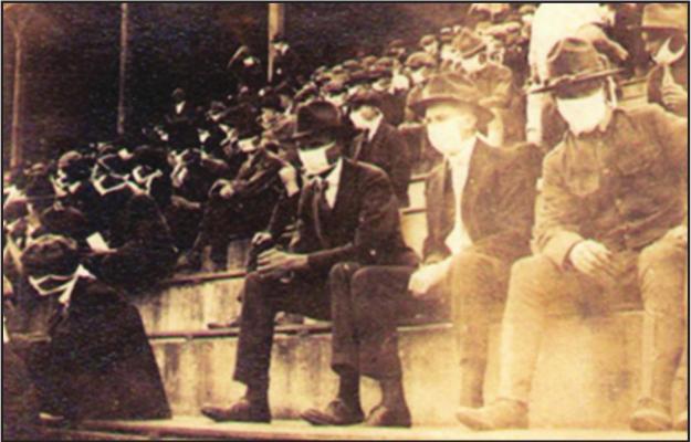 FANS MASKED up for a Georgia Tech football game in 1918.
