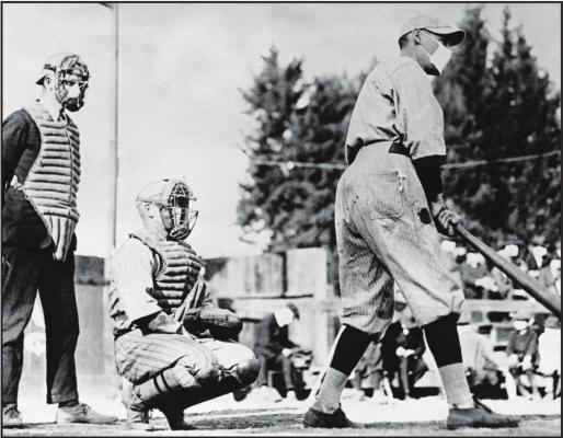 BASEBALL GAMES were played but players wore masks during the 1918 pandemic.