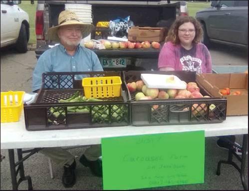 PICTURED IS A vendor booth containing produce at the Ponca City Farmer’s Market. The Farmer’s Market is ongoing through the end of September or until the first freeze or the produce runs out. This is every Tuesday evening and Saturday mornings. (News Photo by Jessica Windom)