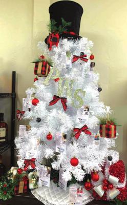 Pictured below is the Angel Tree at Plaza Wine and Spirits with pet angels hanging from the tree. (News photo provided by Plaza Wine and Spirits.)