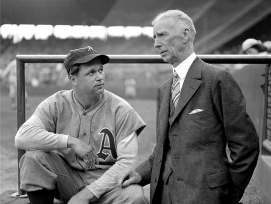 CONNIE MACK is shown here with one of his Hall-of-Fame players, Jimmy Foxx. Mack was owner-manager of the Philadelphia Athletics for many years before his family sold their interests in the team and it was purchased in 1955 by Arnold Johnson and moved to Kansas City.