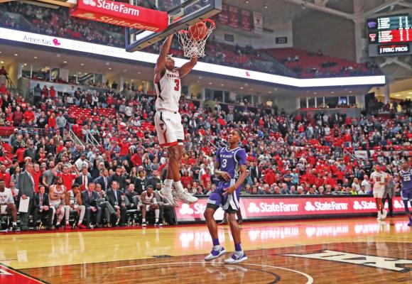 JAHMI’US RAMSEY (3) of Texas Tech (3) dunks during a basketball game against Kansas State Wednesday in Lubbock, Texas. Texas Tech won the game 69-62. (AP Photo)
