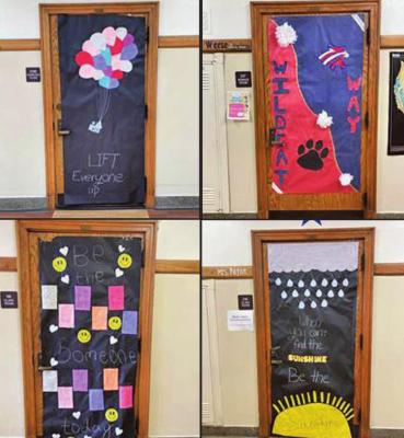 East Middle School Student Council members decorate teacher doors to foster kindness