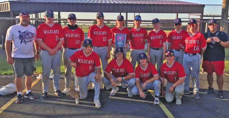 MEMBERS OF the Ponca City Wildcats summer baseball team pose with the league championship trophy they earned this year.