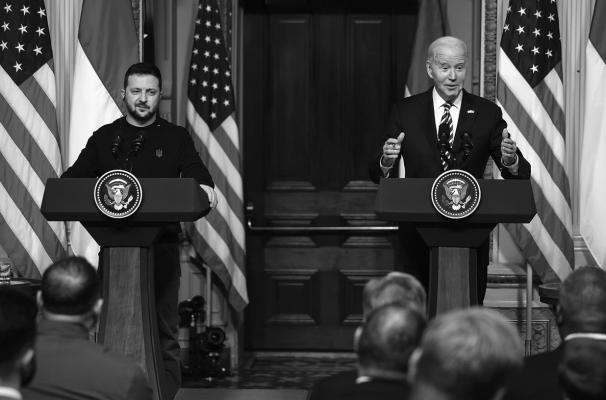 UKRAINIAN PRESIDENT Volodymyr Zelensky (left) and U.S. President Joe Biden hold a news conference in the Indian Treaty Room of the Eisenhower Executive Office Building on Dec. 12, 2023, in Washington, DC. (Chip Somodevilla/Getty Images/TNS)