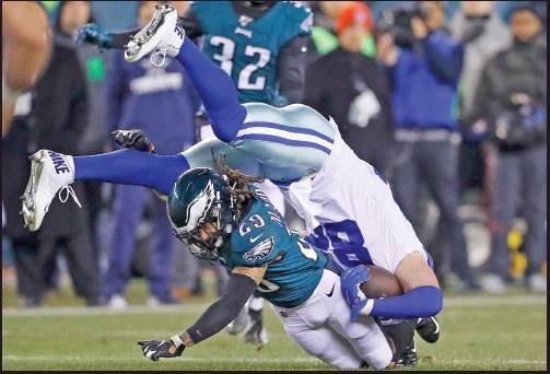 PHILADELPHIA EAGLES cornerback Avonte Maddox (29) brings down Dallas Cowboys tight end Jason Witten during an NFLgame Sunday in Philadelphia. The Eagles won 17-9. (AP Photo)