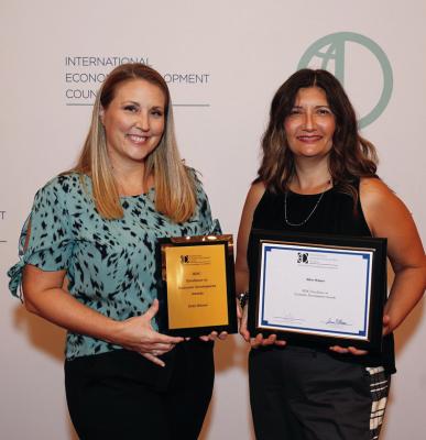 RECEIVING AWARDS at the 2023 International Economic Development Council’s yearly conference are Lori Henderson, Director of Operations, and Kat Long, Small Business Support. Photo provided