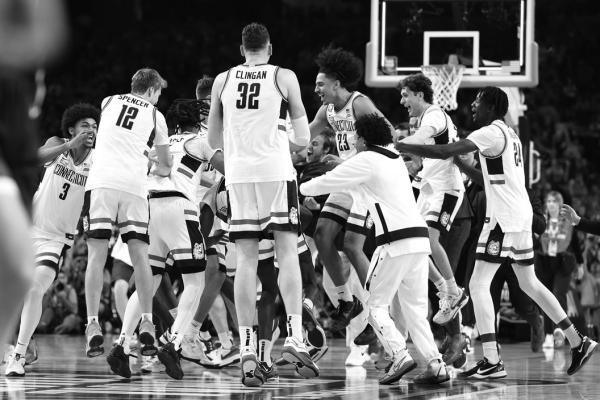 THE CONNECTICUT Huskies celebrate after beating the Purdue Boilermakers 75-60 to win the NCAA Men’s Basketball Tournament National Championship game at State Farm Stadium on Monday, April 8, 2024, in Glendale, Arizona. (Jamie Squire/Getty Images/TNS)