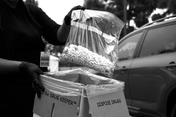 A BAG of assorted pills and prescription drugs dropped off for disposal is displayed during the Drug Enforcement Administration (DEA) 20th National Prescription Drug Take Back Day on April 24, 2021, in Los Angeles. (Patrick T. Fallon/AFP/Getty Images/TNS)