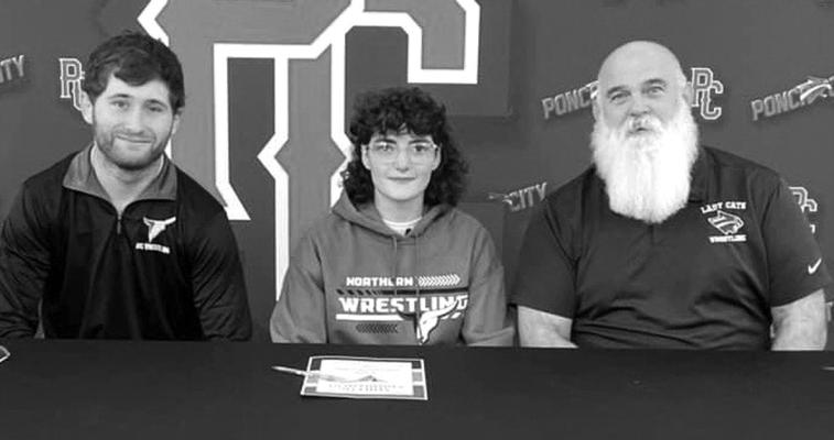 PORSCHA KREGER of Ponca City signed a letter of intent to wrestle at Northern Oklahoma College in Tonkawa. Kreger is the first girl wrestler from Ponca City High School to sign a letter of intent to wrestle in college. With her are NOC’s women’s Coach Jayden Miller, left, and Ponca City Coach Richard Agee.