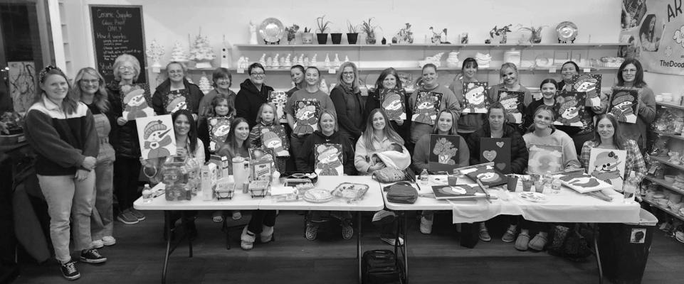 THE DOODLE Academy held a paint party fundraiser with Terry, Stevie, and Ellie of the Po-Hi Travel Group on Saturday, Jan. 20 to raise some money for their upcoming trips to Japan in 2024 and Germany/France/Spain in 2025. Drinks and snacks were provided to those who participated in painting a snowman to support these girls on their future trips. (Photo Provided)