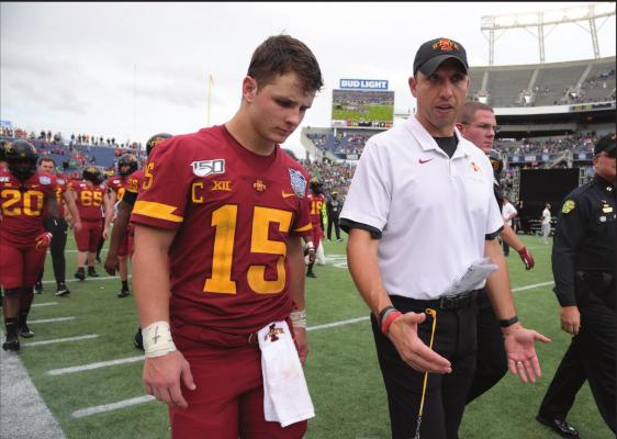 IOWA STATE head coach Matt Campbell, center, walks off the field with quarterback Brock Purdy after the Camping World Bowl NCAA college football game against Notre Dame Saturday, Dec. 28, 2019, in Orlando, Fla. Iowa State enters this season off its second-best three-year stretch in program history and with its sights set on doing something it’s never done — make the Big 12 championship game. (AP Photo/Phelan M. Ebenhack, File)