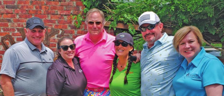 Pictured from the left the first place team members are: Kent Seiler, Sheila Stransky, Rod Alexander (Director of Golf at Wentz Golf Course), Jennifer Swords, Josh Pitts, and Wendy Stobbe (CEO of Hospice of NCO) in the courtyard at Ody’s Sports Bar. (Photo by Darlene Engelking)