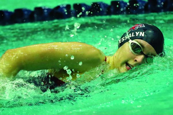 Swimmers pile up points in last home meet