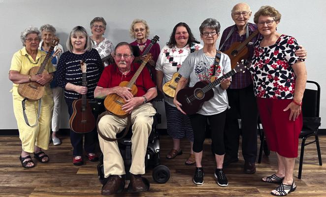 THE SENIOR Strummers of Ponca City presented a patriotic concert at the Ponca City Senior Center on July 3rd. The members represent RSVP of Kay County as volunteers. Members include from left to right, Rosemary Baron, Nancy Silvy, Marsha Deal, Judi Page, Van Page, Lucy Page, Gina Bowman, Pam Bunt, Keith Hunter, Karen, Hunter. Not pictured Janet Goll and Jeff O’Kelly. (Photo provided)