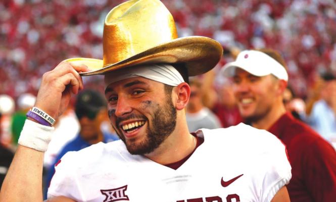 HERE OKLAHOMA’S Baker Mayfield puts on the Golden Hat after the Sooners defeated Texas in the Red River Rivalry several years ago. The hat goes to the winner of the rivalry game.