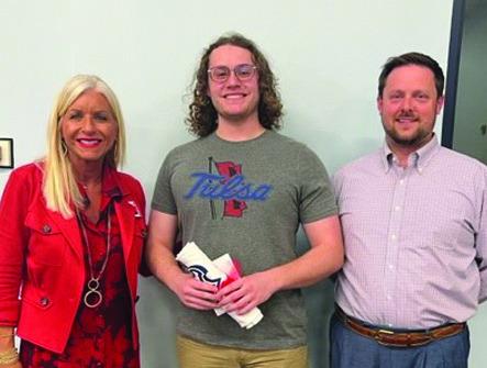 Pictured left to right: Shelley Arrott (PCPS Superintendent), Connor McQueen (Wildcat of the Week) and Chad Keilman (Po-Hi Chorale Director) Photo provided