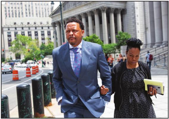 IN THIS JUNE 7, 2019, file photo, former Oklahoma State assistant basketball coach Lamont Evans leaves Federal Court in New York. An NCAA infractions committee panel announced Friday, June 5 2020, that former Oklahoma State assistant men’s basketball coach Lamont Evans violated ethicalconduct rules by accepting up to $22,000 in bribes from financial advisers. (AP Photo/Kevin Hagen, File)