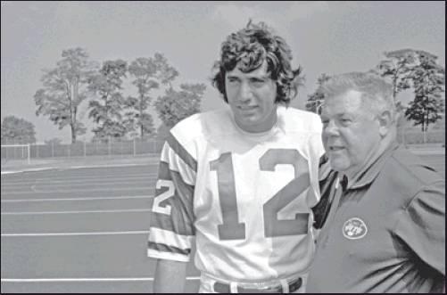 JOE NAMATH, left, quarterback for the New York Jets, talks with Jets head coach Weeb Ewbank during a football practice session in 1970. As part of its celebration of its 100th season, the NFL is designating a Game of the Week, each chosen to highlight a classic matchup. For Week 2, it was the Monday night game between the Browns and Jets. Joe Namath and Leroy Kelly were supposed to be the offensive stars in the inaugural game of pro football’s prime-time telecasts. But the guys who moved the ball best were 