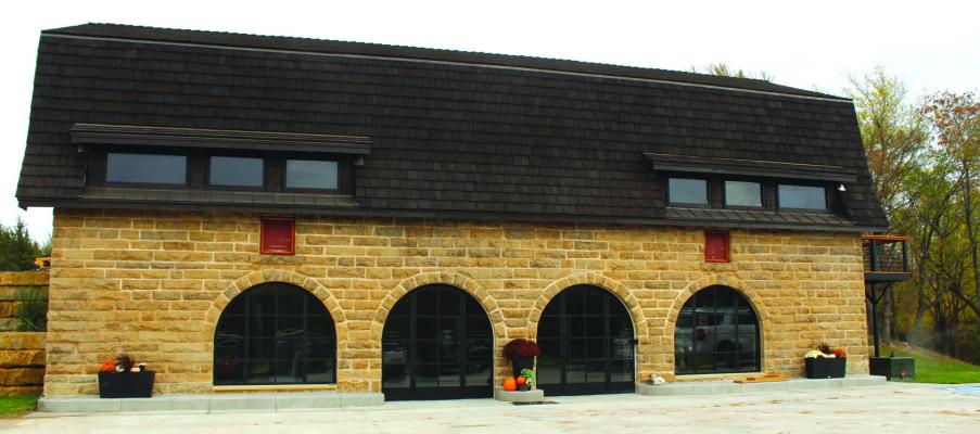 Local business owners restore historic stone barn