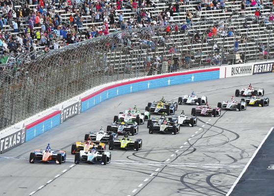 IN THIS JUNE 8, 2019, file photo, drivers jockey for position at the start of an IndyCar auto race at Texas Motor Speedway in Fort Worth, Texas. IndyCar is getting ready for an all-in-one-day season opener on the fast track in Texas, more than 2 ? months after drivers were set to roll on the streets of St. Pete. The pandemic-delayed season is now set to open Saturday, June 6, 2020. (AP Photo/Larry Papke, File)