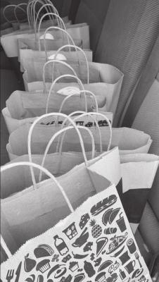 LUNCH DONATION bags offered by the New Emergency Resource Agency.