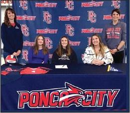 EMMA STRONG of Ponca City Friday signed a letter of intent to play volleyball at Oklahoma Wesleyan in Bartlesville. Among those at the signing were, from left, Oklahoma Wesleyan assistant coach Tawna Scantlin, Maci Strong, sister; Emma Strong, Carol Strong, mother; and Jennie Hinterreiter, Ponca City head volleyball coach.