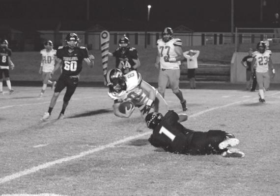 Jaidyn Guzman (1) tackles the Crescent quarterback behind the line of scrimmage. (Melissa Swords photo)