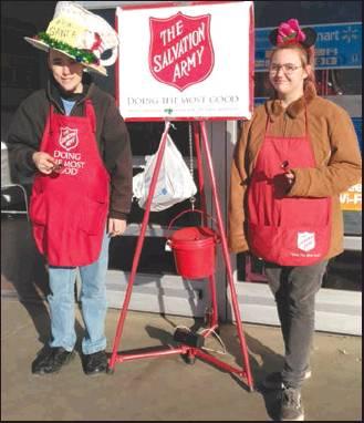 PICTURED ARE bell ringers Warren Ulrich and Madyson Mason from last year during the Red Kettle Campaign at Walmart for the Salvation Army yearly fundraiser.